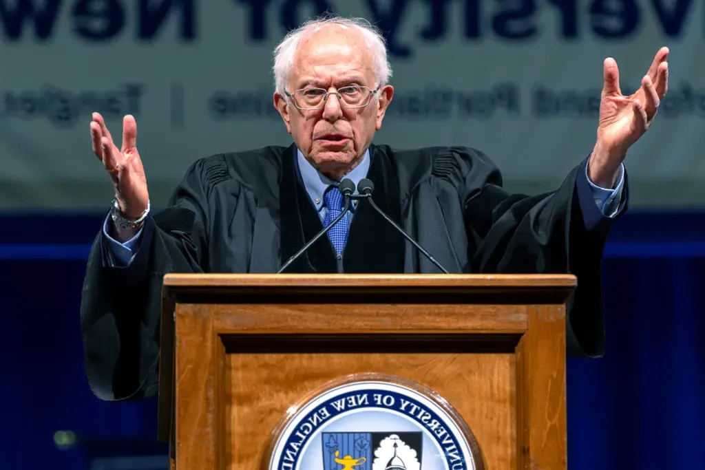 Commencement speaker Bernie Sanders addresses the crowd at the U N E 2024 graduation ceremony